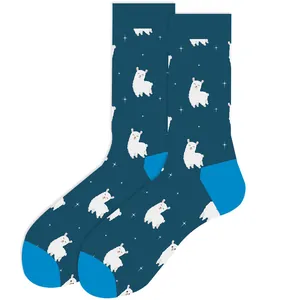 Close-up of funny crew socks featuring a cute cartoon white llama and star pattern