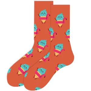 Close-up of cute cartoon ice cream with flamingo swim ring pattern on orange mid-calf socks