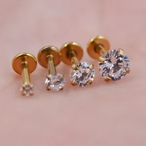 Detailopname van roestvrijstalen labret piercings met ronde zirkonia in vier maten