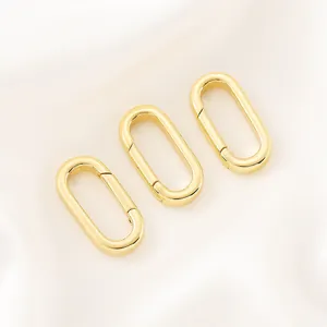 Détail de trois fermoirs à ressort ovales plaqués or 14K pour la bijouterie DIY
