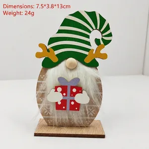 Detailed view of a wooden Christmas gnome figurine with antlers and a long white beard
