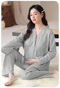 Full body shot of Asian model wearing grey long-sleeve cotton maternity pajama set