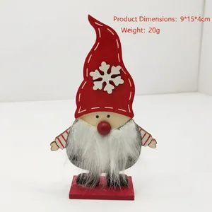 Decorative wooden Christmas gnome figurine with long white beard and red snowflake hat
