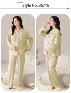 Full view of light green long-sleeved maternity pajama set with built-in nursing pads
