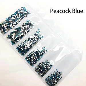 Assortiment de strass à dos plat bleu paon pour le nail art professionnel et la décoration DIY