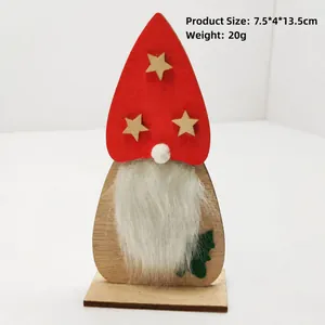 Handcrafted wooden Christmas gnome ornament with white fuzzy beard and red hat detail