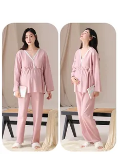 Detailed view of pink maternity nursing pajama set with lace V-neck and long sleeves.