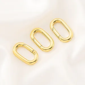 Vue détaillée des fermoirs à ressort ovales plaqués or 14 carats pour création bijoux.