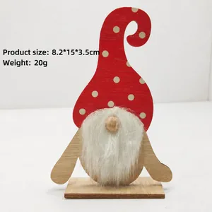 Handcrafted wooden Christmas gnome ornament with red polka dot hat and white beard