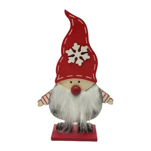 Handcrafted wooden Christmas gnome ornament featuring a white fur beard and a red hat
