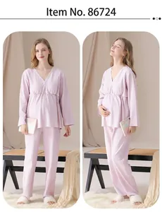 Pink maternity pajamas set featuring V-neck lace trim and long sleeves for pregnancy