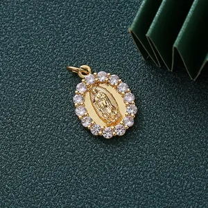 Detailed view of gold-plated Virgin Mary pendant with sparkling micro-paved zircons