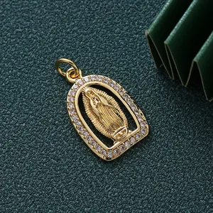 Close-up of Virgin of Guadalupe pendant with gold plating and sparkling zirconias