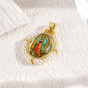 Detailed macro shot of gold Virgin of Guadalupe pendant with pearl border