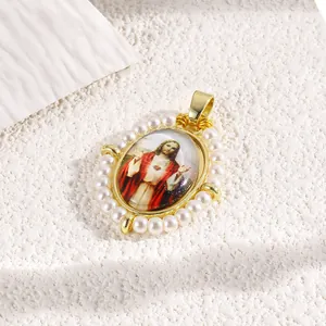 Close-up of a religious Jesus pendant with hand-woven pearls and gold plating