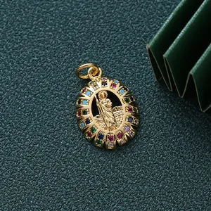 Close-up view of gold-plated religious pendant featuring colorful zircon micro-inlay