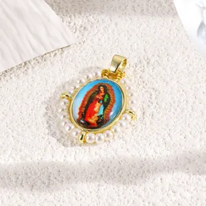 Detailed view of handmade pearl border on Virgin of Guadalupe oval pendant