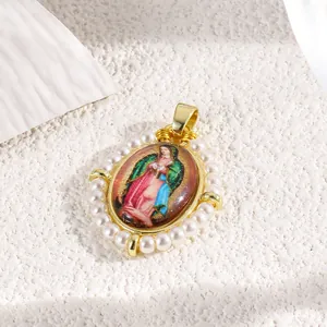 Detailed view of Virgin of Guadalupe pendant with gold plating and pearl border