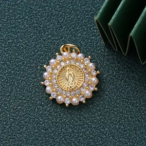 Detailed view of gold-plated Virgin Mary pendant with sparkling zirconia and pearls