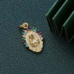 Close-up of gold-plated religious pendant with colorful zircon stones for DIY necklace
