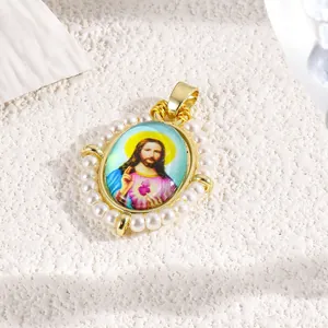 Detailed macro view of an oval Jesus pendant with elegant white imitation pearl border