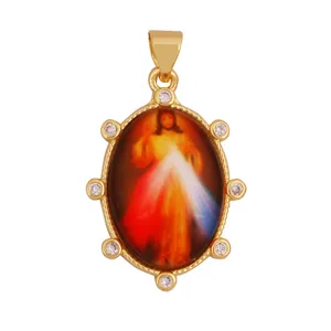 Close-up detail of Divine Mercy pendant in 18K gold plated brass with white zircons