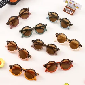 Occhiali da sole rotondi leopardati per bambini in vari colori vivaci e alla moda
