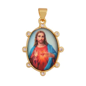 Detailed view of 18K gold-plated sacred heart Jesus pendant with sparkling zircon stones