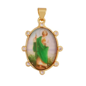 Detailed view of vintage 18K gold-plated oval pendant featuring Saint Jude and clear zircons.