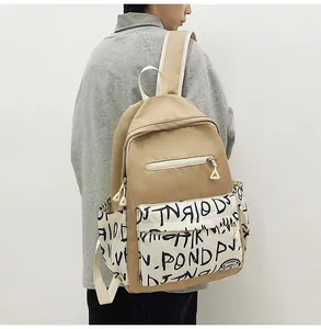 Stylish casual large capacity backpack featuring artistic graffiti print for students