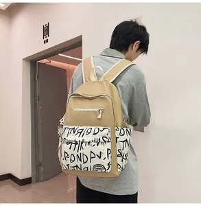 Trendy khaki backpack with graffiti print for students, featuring a large capacity design.