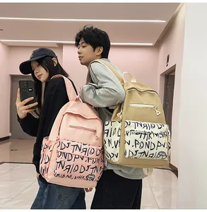 Stylish large capacity backpacks with graffiti print for students in casual setting