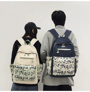 Rear view of trendy graffiti print large capacity student backpacks for outdoor travel