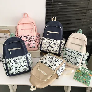 Large capacity student backpacks in multiple colors with graffiti print and front pockets