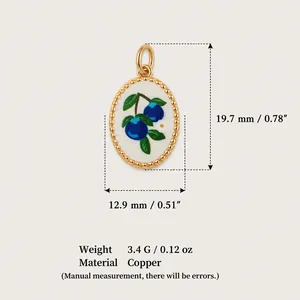 Pastoral style copper oval pendant with blueberry design and gold finish