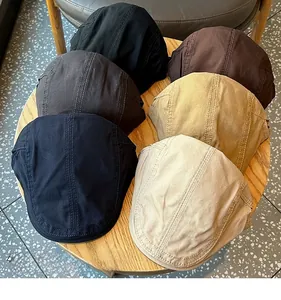 Detailed view of vintage cotton newsboy caps in various versatile colors