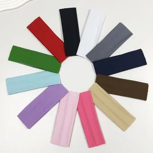 Vibrant circle arrangement of 12 colorful wide elastic sports headbands for yoga workout
