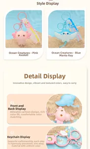 Detail view of cute cartoon ocean animal keychains featuring pink axolotl and blue manta ray.