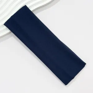 Close-up of navy blue 7cm wide high elastic sports headband with soft knit texture
