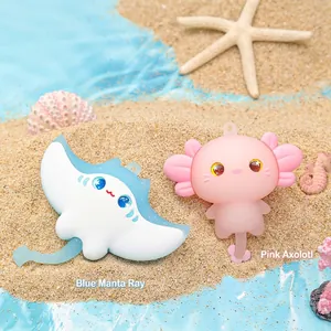 Cute ocean animal keychains with blue manta ray and pink axolotl for bag decoration