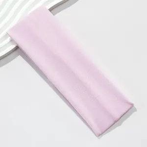 Detail view of a 7cm wide lavender elastic headband with soft breathable fabric