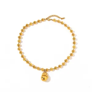Elegant 18k gold plated stainless steel beaded necklace with an organic pendant detail