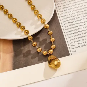 Elegant 18k gold plated stainless steel bead chain necklace with abstract bean pendant