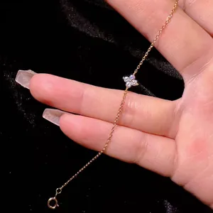 Elegant S925 sterling silver gold plated anklet featuring a crystal four-leaf clover charm