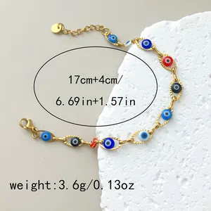 Detail view of a retro gold evil eye bracelet with 17+4cm length and 3.6g weight specs