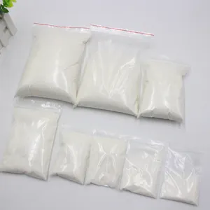 Detailed view of artificial snow powder packed in various sizes of transparent bags