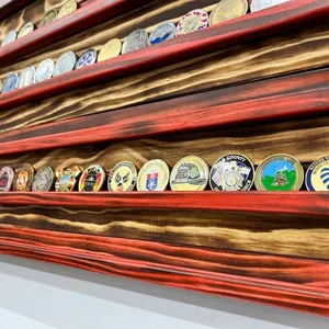 Detail view of a burnt finish wooden American flag challenge coin display rack.