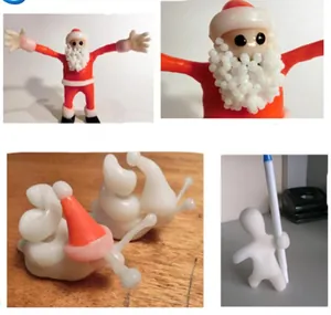 Detailed view of DIY crafts made with artificial magic snow shaped into Santa Claus