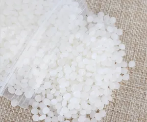 Detailed macro shot of white artificial snow granules for festive Christmas decoration and DIY crafts