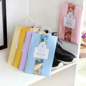 Detail view of colorful scented sachets with hooks for long-lasting closet fragrance.